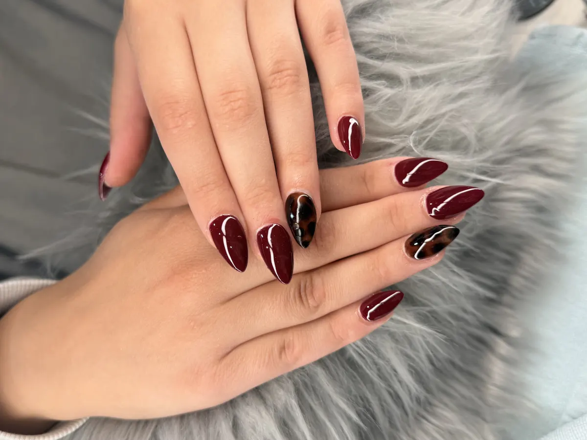 Long burgundy extensions by BeU
